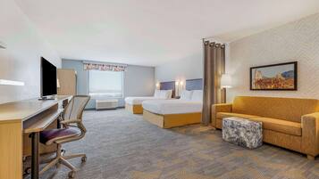 Hypo-allergenic bedding, desk, laptop workspace, blackout drapes