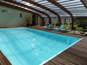 Alberca techada y alberca climatizada