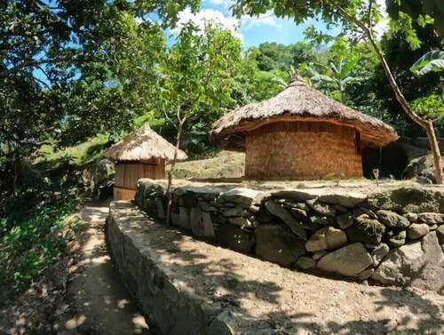 Private waterfall and indigenous house!