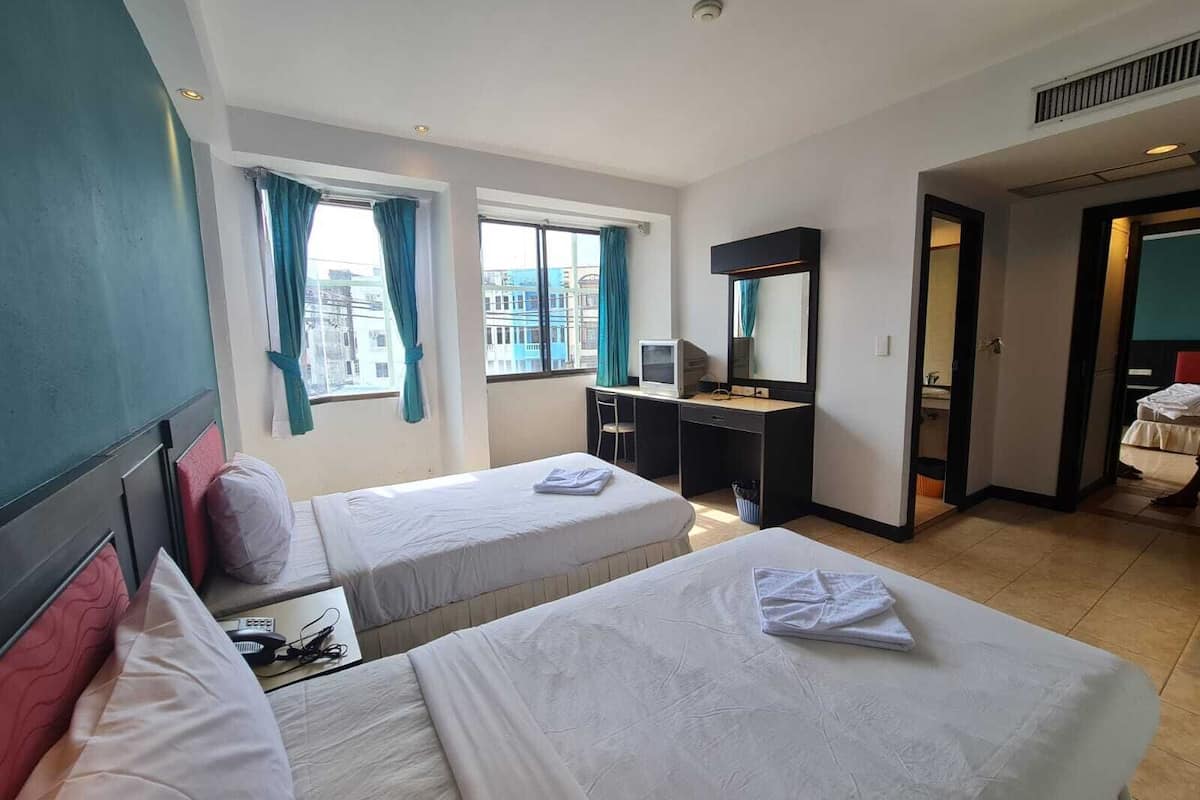 Superior Double or Twin Room | Minibar, in-room safe, individually furnished, desk