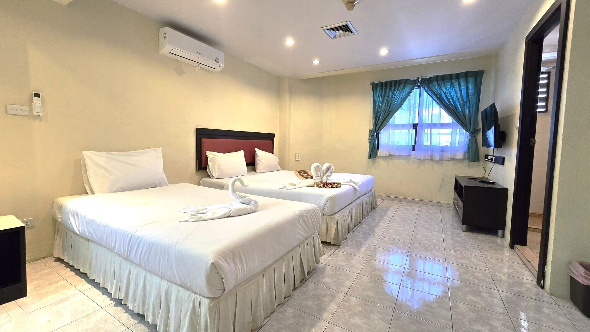 Family Triple Room | Minibar, in-room safe, individually furnished, desk