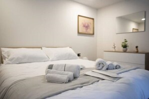 2 habitaciones, tabla de planchar con plancha y wifi gratis 