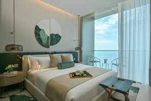 Appartement, 2 chambres, vue sur la mer | Literie de qualité, couette en duvet, minibar, coffre-fort