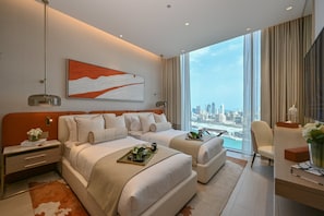 Premium bedding, down comforters, minibar, in-room safe