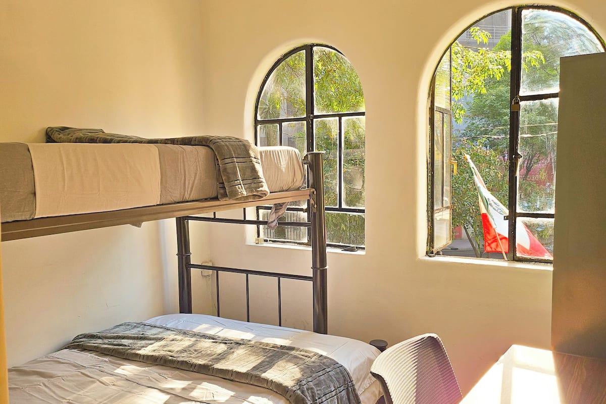 Family Room | Desk, bed sheets