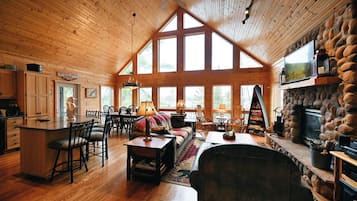 Cabin, Multiple Beds, Fireplace | Living area | 40-inch TV with cable channels, fireplace