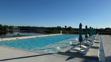 Seasonal outdoor pool, pool umbrellas