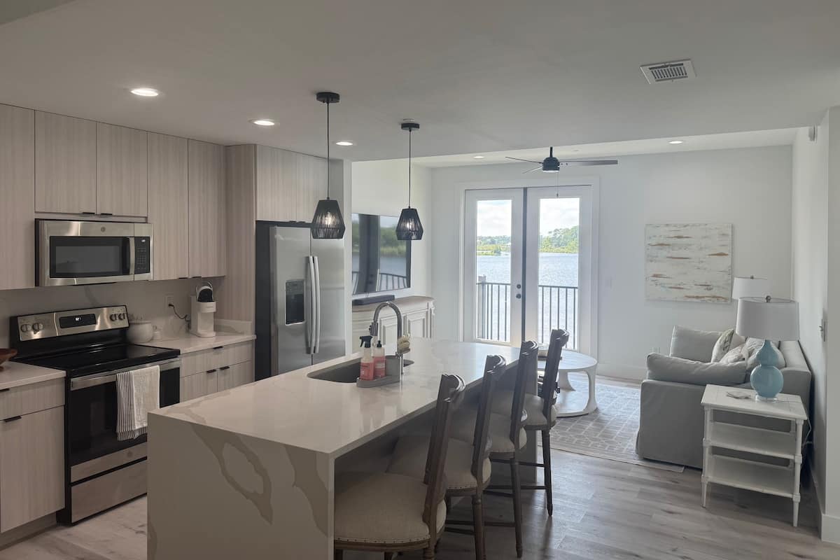 Signature Condo, 1 Queen Bed, Pool Access, River View | Living area | 55-inch flat-screen TV with digital channels