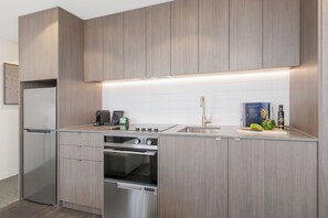 Two Bedroom Apartment | Private kitchen | Full-size fridge, microwave, dishwasher, espresso maker - Punthill Tuggeranong (Greenway)