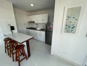 Fridge, dishwasher, blender, cookware/dishes/utensils