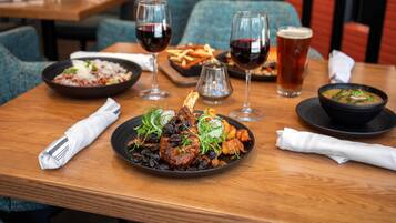 Breakfast and dinner served, local cuisine