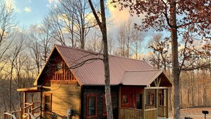 A cabin with a metal roof, wooden exterior, and a porch. - Briar Patch Cabin RRG: Firepit, Sunset, WIFI (Stanton)