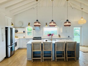 Fridge, microwave, oven, stovetop - ShuggaBreeze on Great Guana Cay. Expansive home with Private Pier and Beach. (Great Guana Cay)