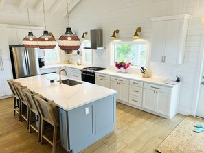Fridge, microwave, oven, stovetop - ShuggaBreeze on Great Guana Cay. Expansive home with Private Pier and Beach. (Great Guana Cay)