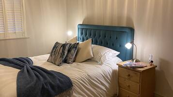 2 dormitorios, tabla de planchar con plancha, wifi gratis y ropa de cama