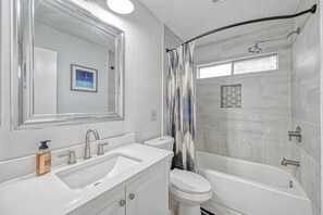Hair dryer, towels, soap, shampoo