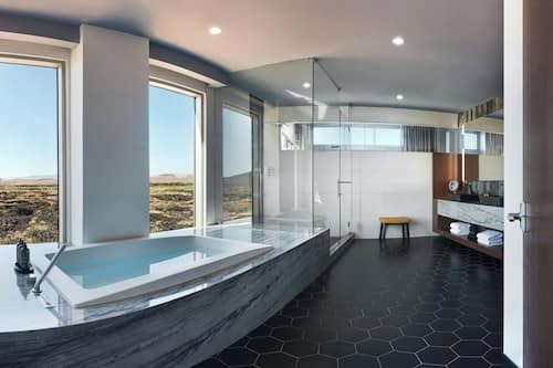 Presidential Suite | Bathroom | Shower, hair dryer, towels, soap