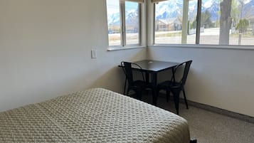 Family Room | 1 bedroom, blackout curtains, bed sheets