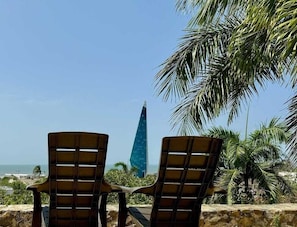 Casa de campo Confort, varias camas, acceso a la alberca, vista a la playa | Área de sala de estar | Smart TV de 43 cm con canales por cable
