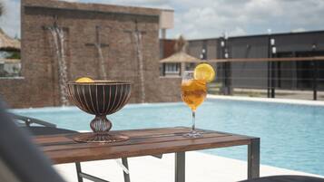 2 indoor pools, outdoor pool, open open 24 hours a day, pool umbrellas