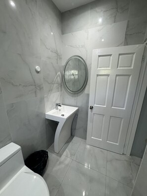 Hair dryer, towels, soap, toilet paper