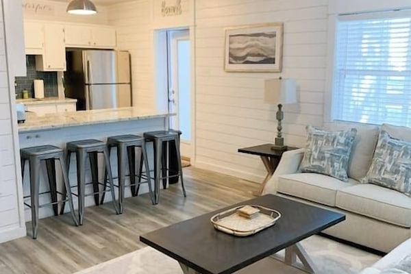 Spacious open-concept design seamlessly connecting the kitchen and living room!