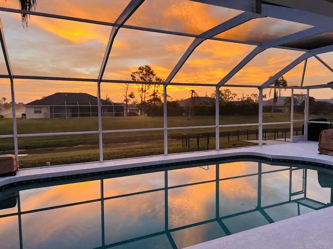 . Welcome to our luxury home with a stunning pool, large lanai and canal views. 