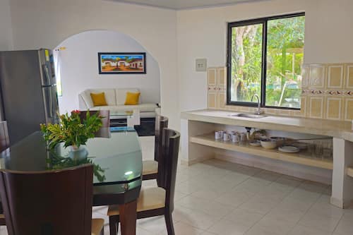 Full-size fridge, dishwasher, coffee/tea maker, blender