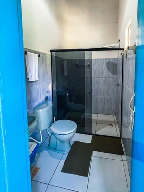 Shower, towels, soap, toilet paper