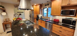 High chair, dining tables - Main floor master, gourmet kitchen, and Hot tub with amazing mountain views (Golden)