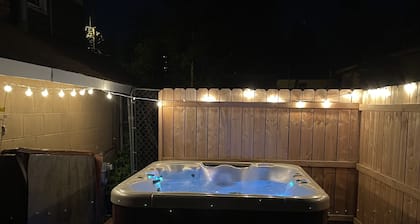 "Prime Location Stylish 1Bedroom with Hot Tub Access, across street from Legion