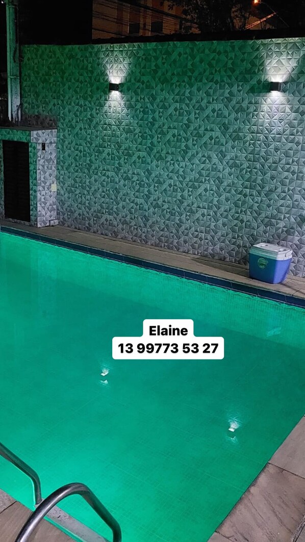 Relax by the pool surrounded by a unique geometric pattern.