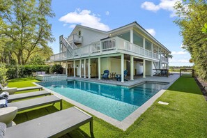 A heated pool - Stay Salty: A Spacious 6-Bedroom Home with Marsh Views in Saint Simons Island (Saint Simons Island)