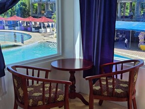 Honeymoon Condo, 1 Queen Bed, Non Smoking, Pool View | Living area - The Blessed Purple Bamboo Beach Resort (Alaminos)
