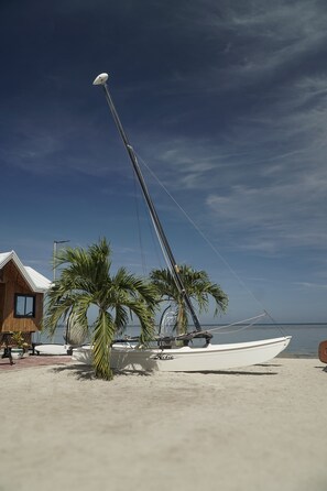 On the beach, beach cabanas, beach umbrellas, beach towels - The Blessed Purple Bamboo Beach Resort (Alaminos)
