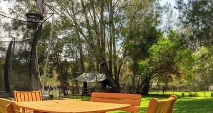 Blue Haven Gypsy Paradise - Cottage plus caravans