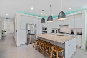 Fridge, microwave, oven, stovetop - The 6 Bedroom Modern Beach Villa with theme rooms (Kissimmee)
