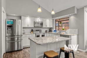 Fridge, microwave, oven, stovetop - Twin Lakes Village Home—Golf Retreat, Community Pool, Corner Lot, and Single-Level Living! (Rathdrum)