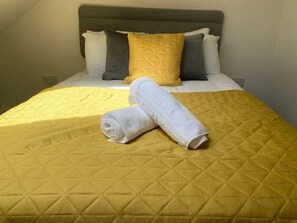 2 dormitorios, tabla de planchar con plancha, wifi y ropa de cama