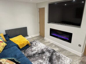 Fernseher, Kamin