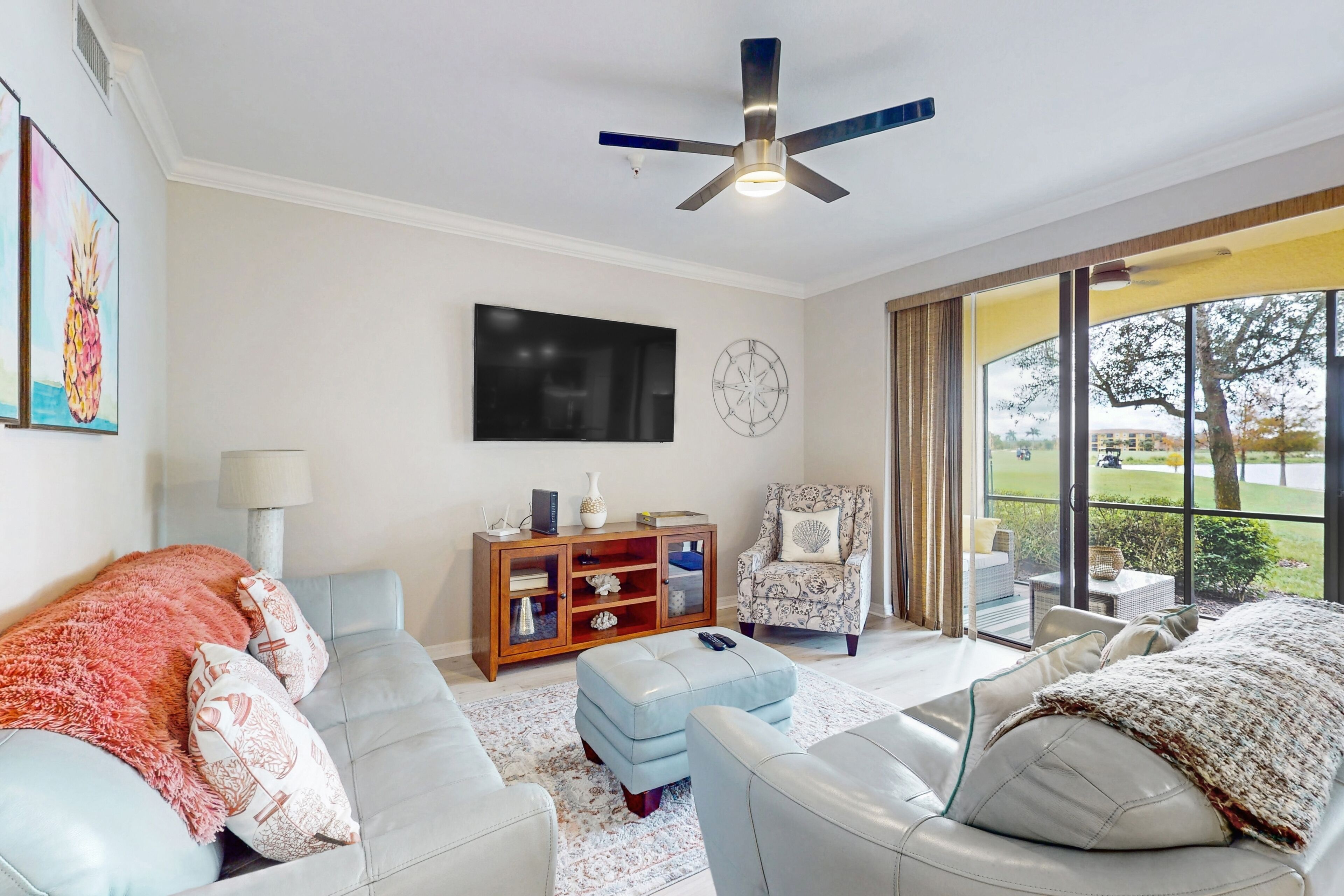 Ground-floor country club condo with water view, pools, golf, & gym