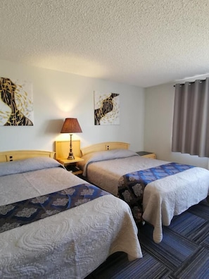 Double Room, Non Smoking | Living area | 40-inch flat-screen TV with cable channels - Country Garden Inn (Smoky Lake)