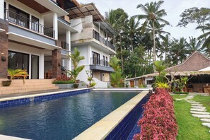 Outdoor pool, open 8:00 AM to 6:00 PM, pool umbrellas, sun loungers