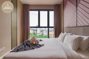 Two Bedrooms Suite | โต๊ะทำงาน, ผ้าม่านกันแสง, เตารีด/โต๊ะรีดผ้า, Wi-Fi ฟรี
