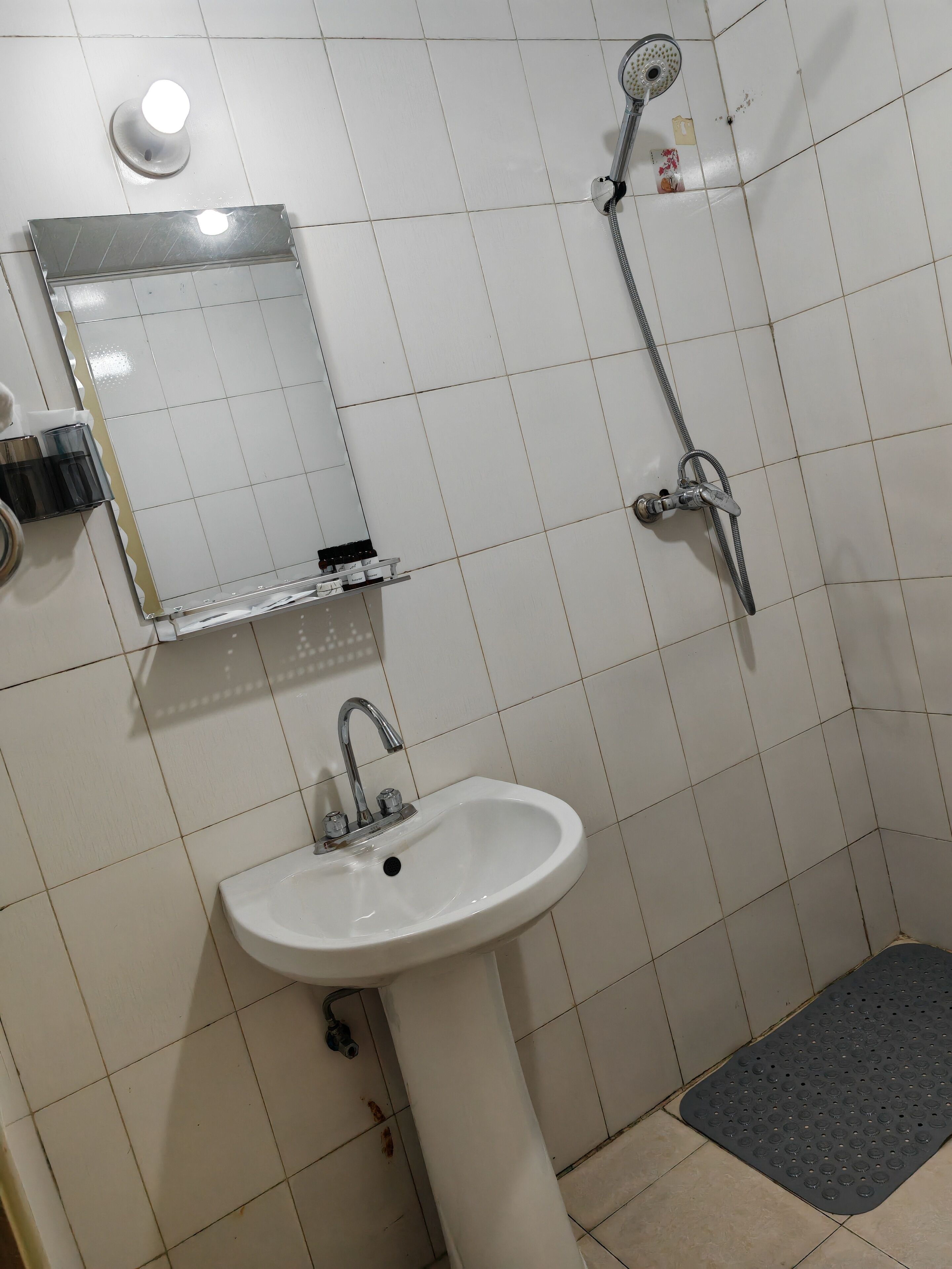 City Apartment | Bathroom | Shower, rainfall showerhead, designer toiletries, hair dryer
