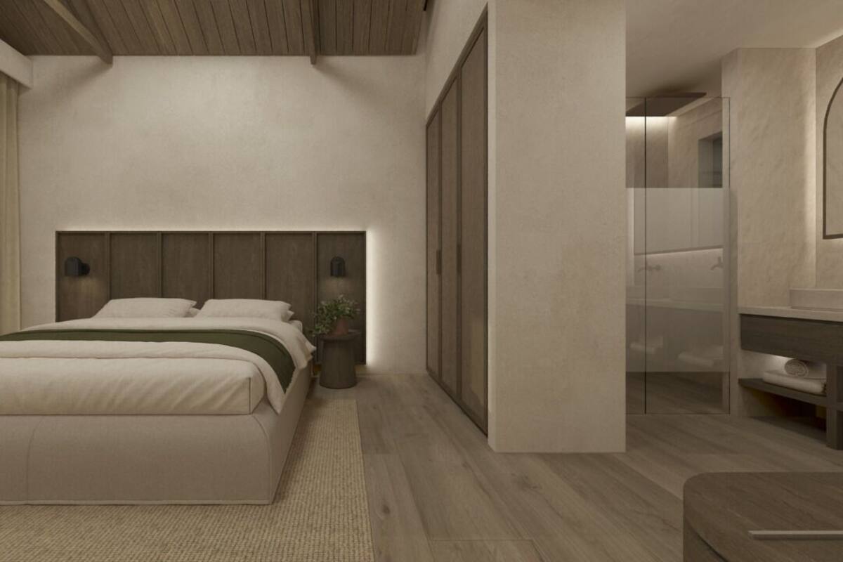 A modern bedroom with a large bed, a bedside table, a nightstand, and a built-in wardrobe.