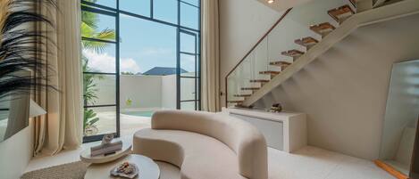 Deluxe Villa | Living area | Flat-screen TV