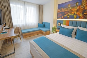 Premium bedding, down comforters, desk, laptop workspace