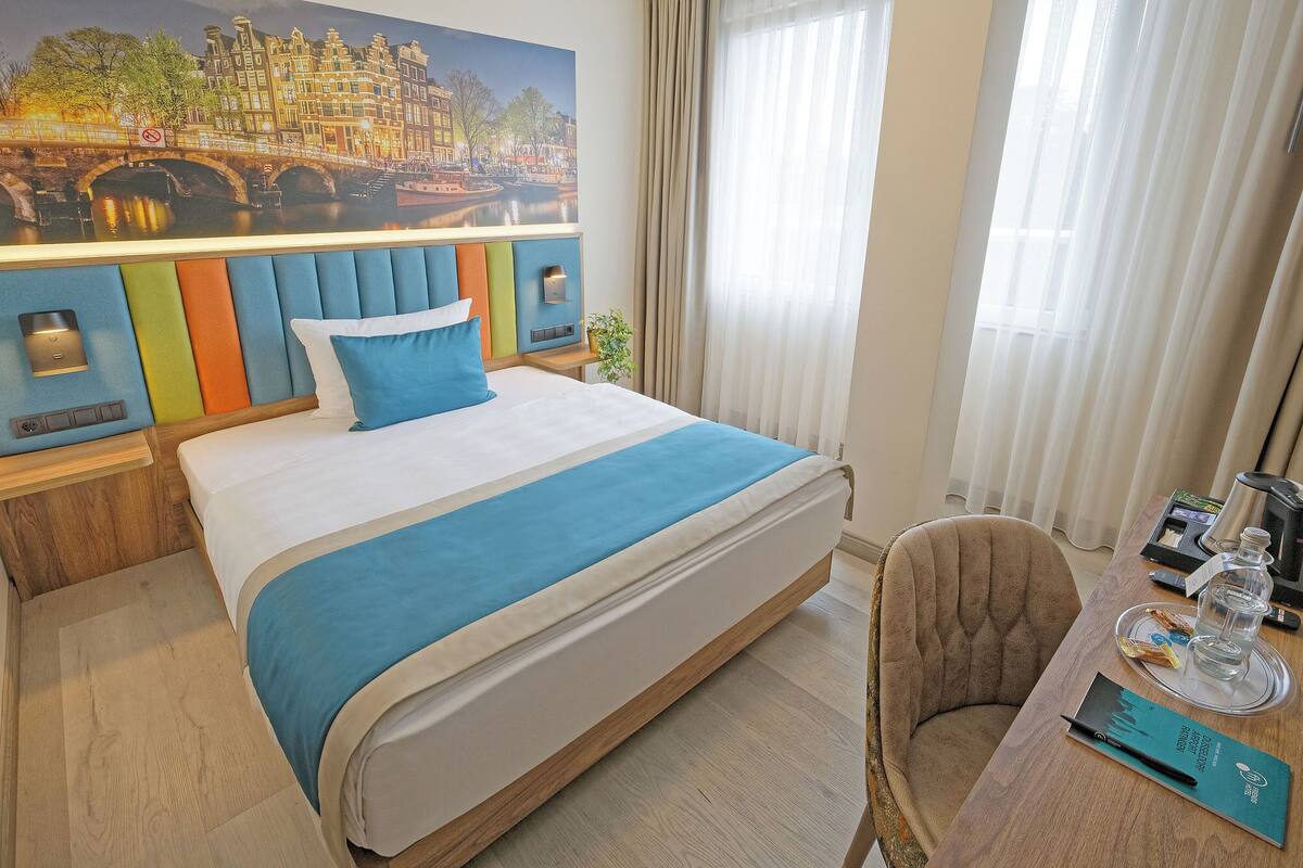 ห้องซูพีเรียซิงเกิล | เครื่องนอนระดับพรีเมียม, ผ้านวมขนเป็ด, โต๊ะทำงาน