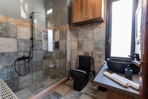 Shower, hair dryer, towels, soap